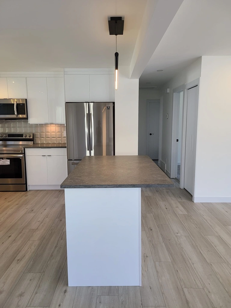 Newly renovated kitchen and adjoining hallway